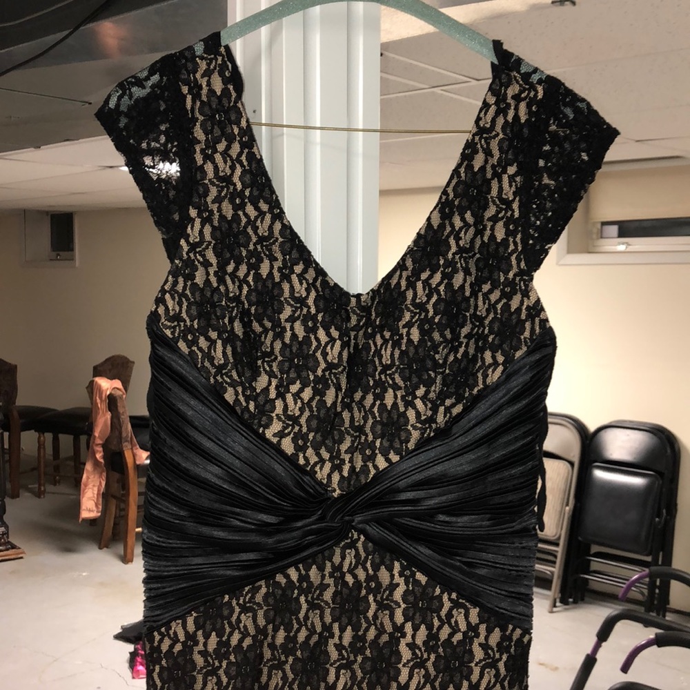 Laced black and nude dress